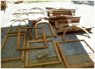 Before: salvaged wood window parts for use in window repair and restoration